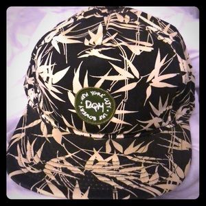 DQM black and white printed SnapBack hat.